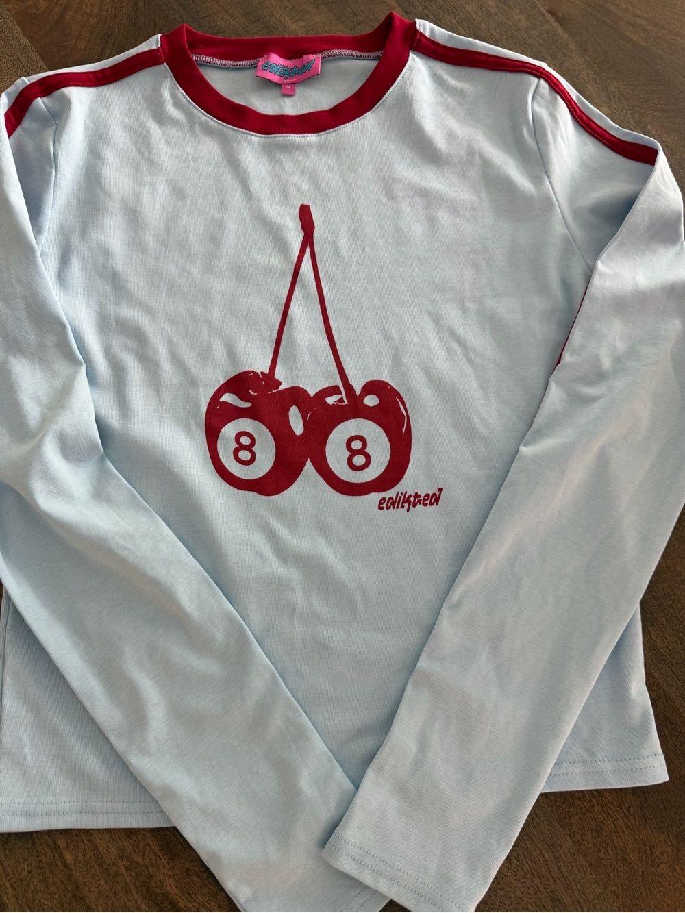 New without tags Edikted Light Blue Long-Sleeve Tee with Red Cherry Graphic